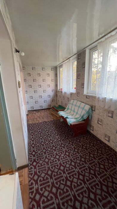 Кибрай байткурган  2 комнатная 77я серия кирпичный дом