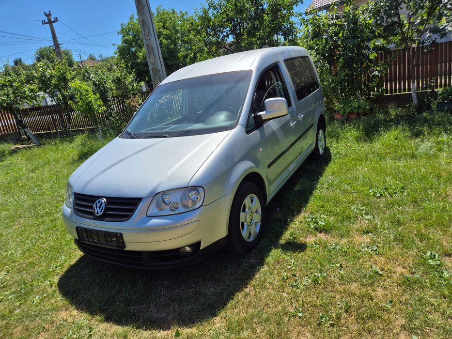 Vw caddy  cu 5 locuri