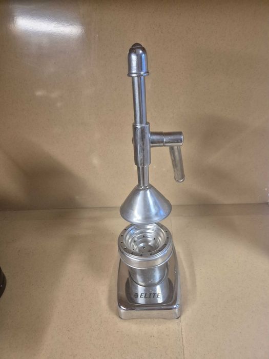 Ръчна цитрус преса