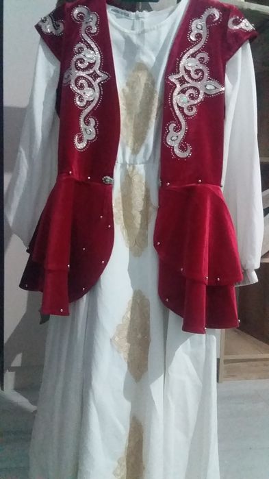 Казакта койлек жилеткасымен бирге