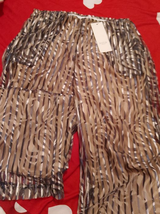 Вечернее брюки для женщины