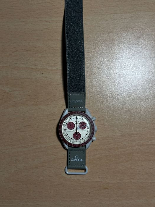 Omega MoonSwatch Pluto Original + Factura
