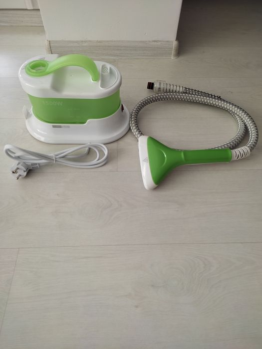 Mașină de călcat cu abur