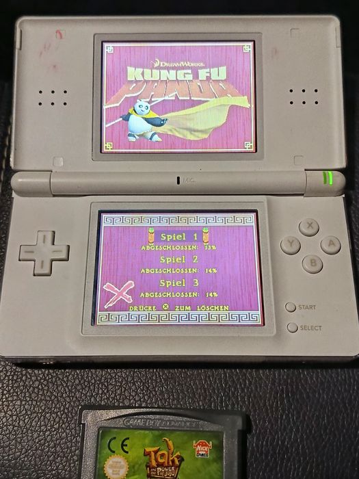 Consola Nintendo DS Lite + incarcator + jocuri