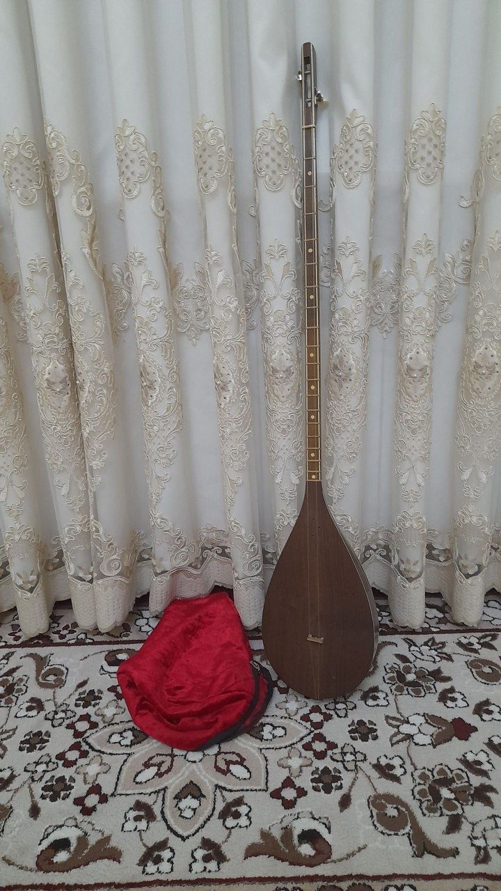 Musiqa cholg'u asbobi Dutor