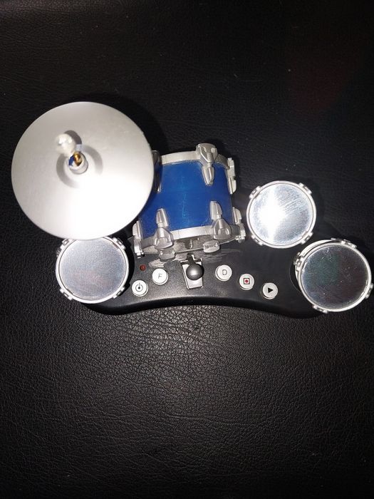 Дървена кукла с българска носия,детски мини барабани и други