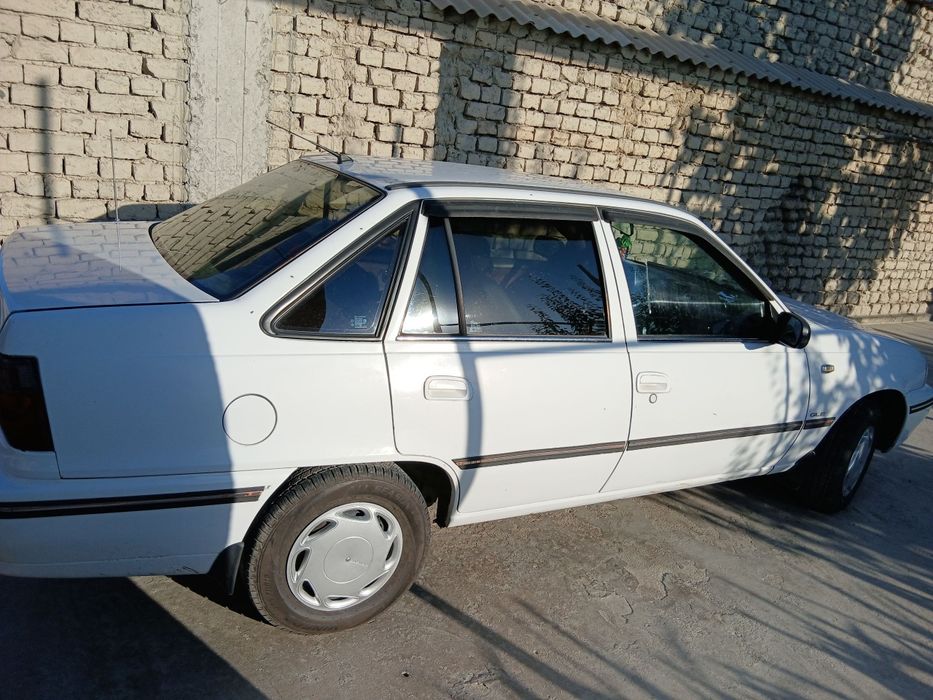 Нексия 1,2003-йил, оқ ранг, метан-бензин, краска радной, аъло холатда