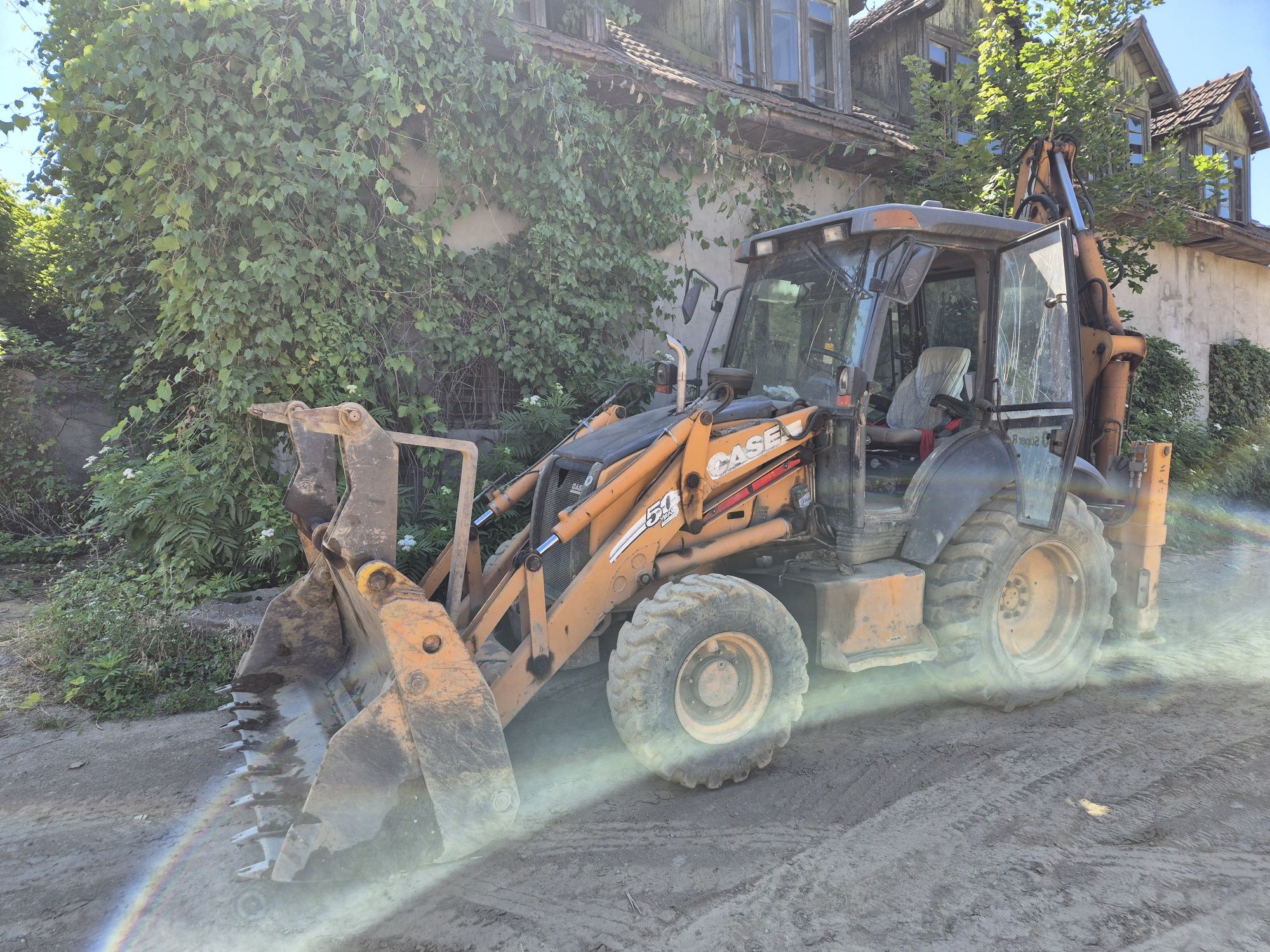Buldoexcavator Case 580 SR