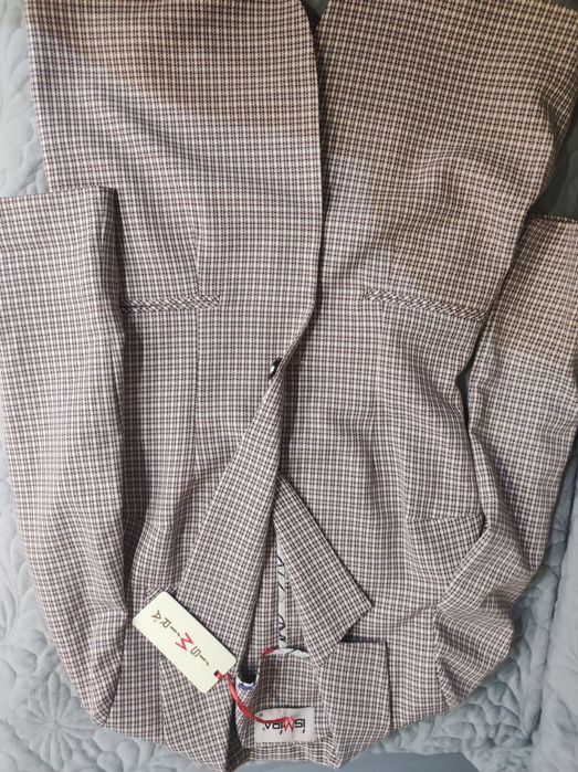 Продам новый Костюм женский