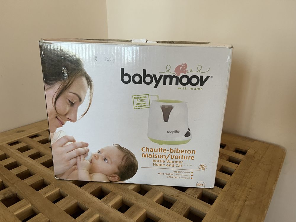 Обещан. Нагревател за шишета babymoov