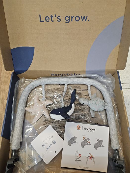 Шезлонг Ergobaby + арка с играчки Ergobaby