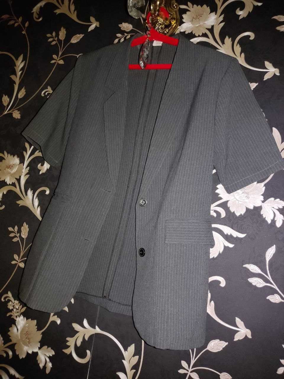 Продам два стильных пиджака,классика,цвет- серый