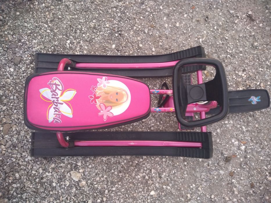 Детска шейна с кормило .