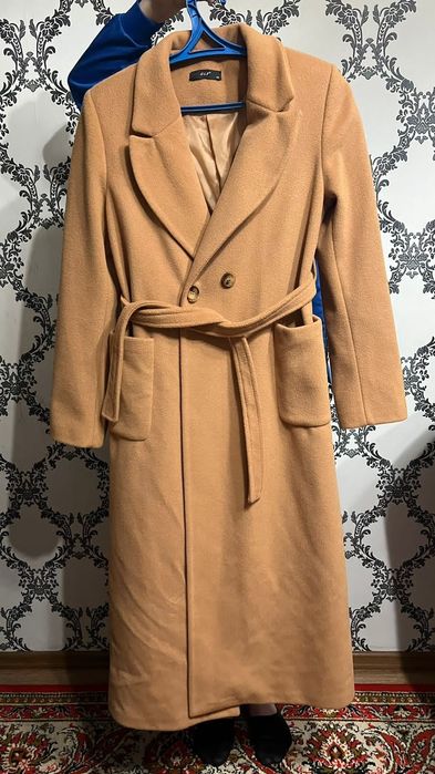 Продам пальто новое