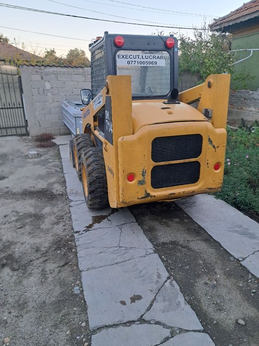 Încărcător frontal ( bobcat ) komatsu sk714
