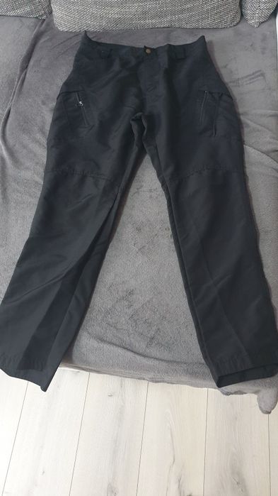 Pantaloni tactici , marimea L . Noi.