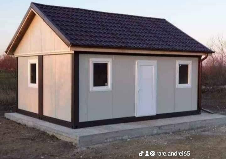 Casa modulara pe structură metalică rezistentă și invelita cu panou sa