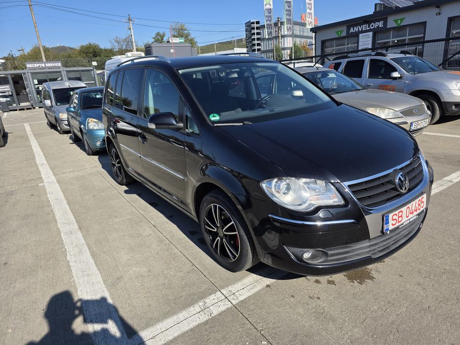 Vand vw touran 7locuri an fab 2009