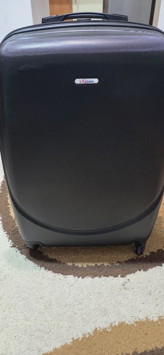 Vând troler negru mare