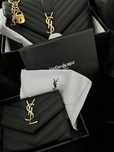 Чанти и портмоне на марката ysl