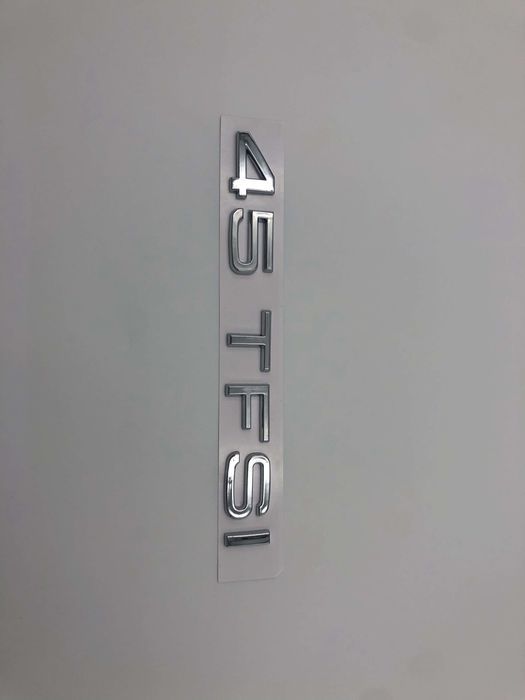 Emblema Audi 45 TFSI spate crom