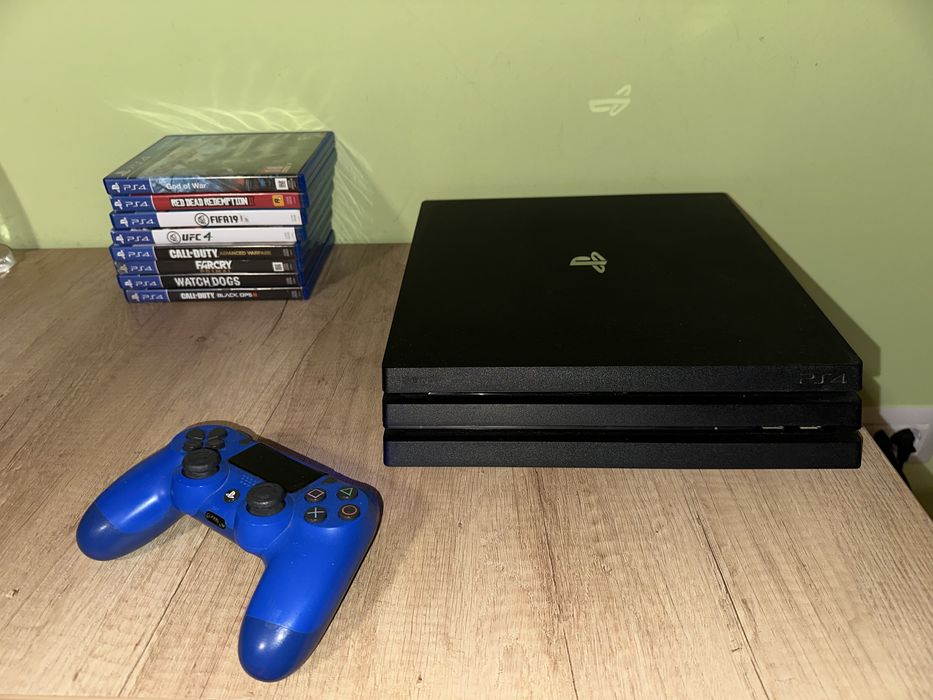 PS4 Pro + 8 Jocuri