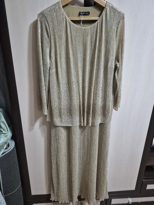 Продам новое платье