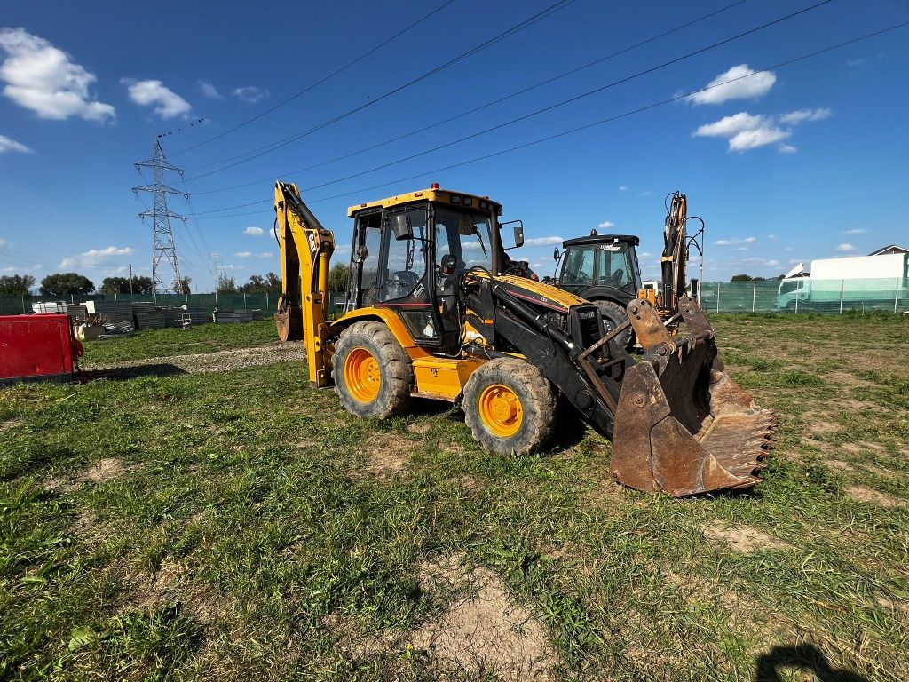 Vând Buldoexcavator CAT 428 C 2001