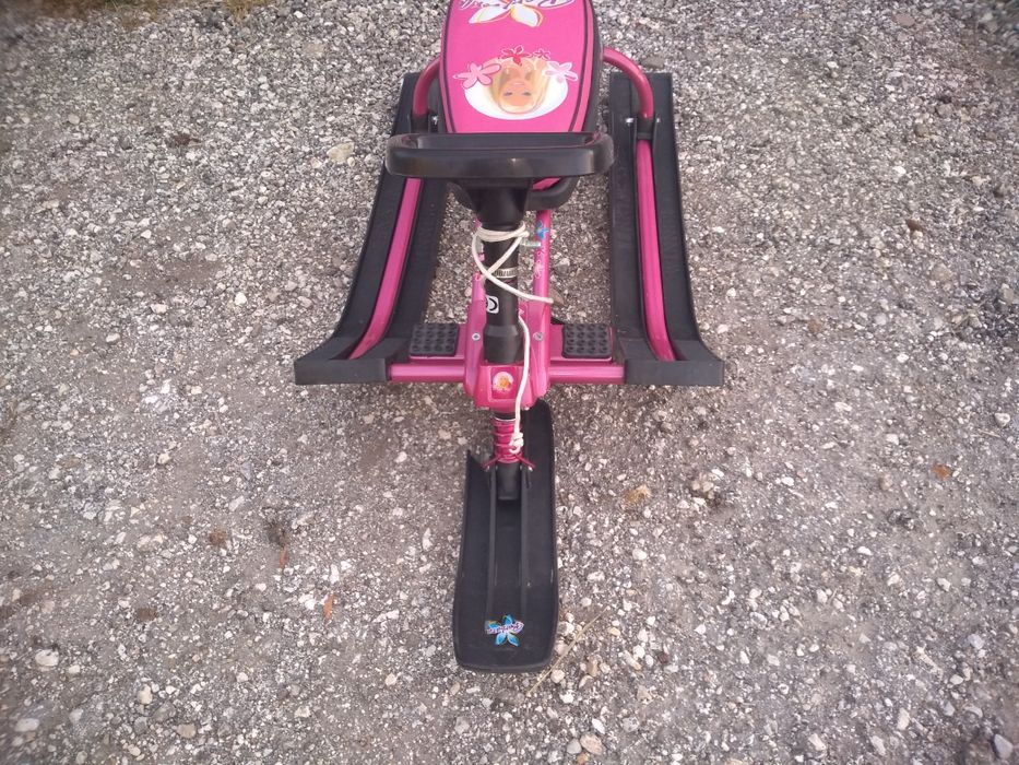 Детска шейна с кормило .