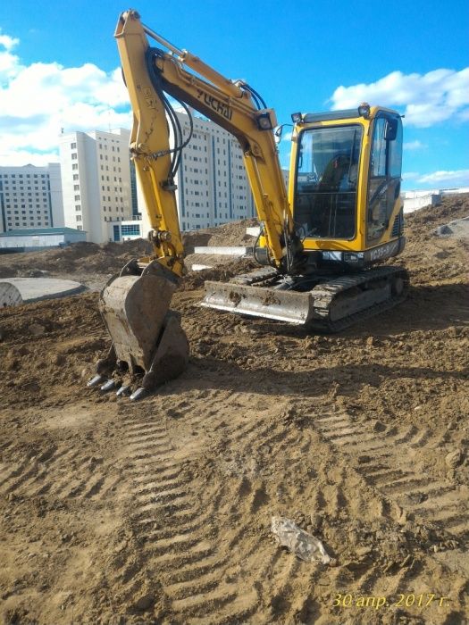 Услуги мини-экскаватора.