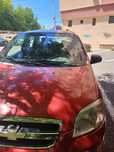 ChevroletAveo an2007  ,1.4 benzina 16 V,94CP culoare rosu flacara,