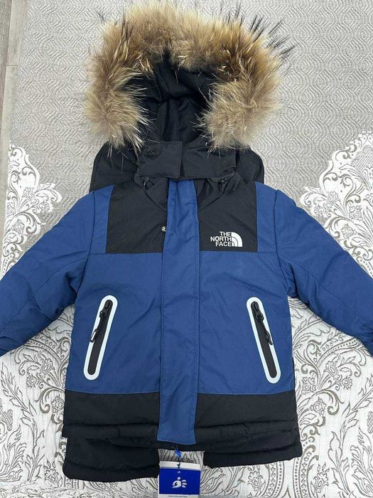 Продам детский зимний комбинезон НОВЫЙ