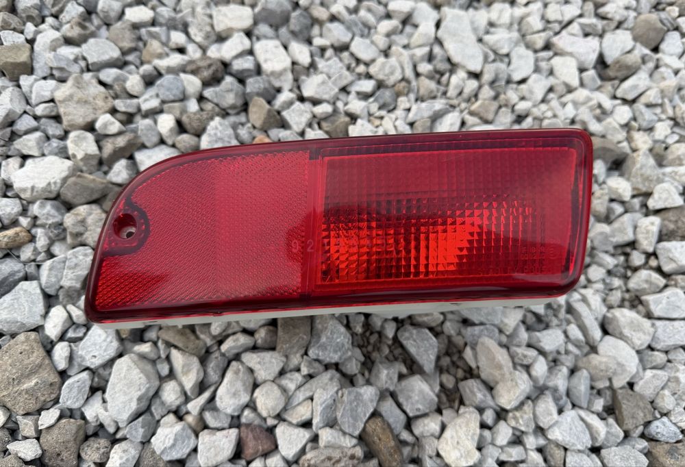 Оригинален ляв стоп в бронята за Subaru Justy / Suzuki Ignis