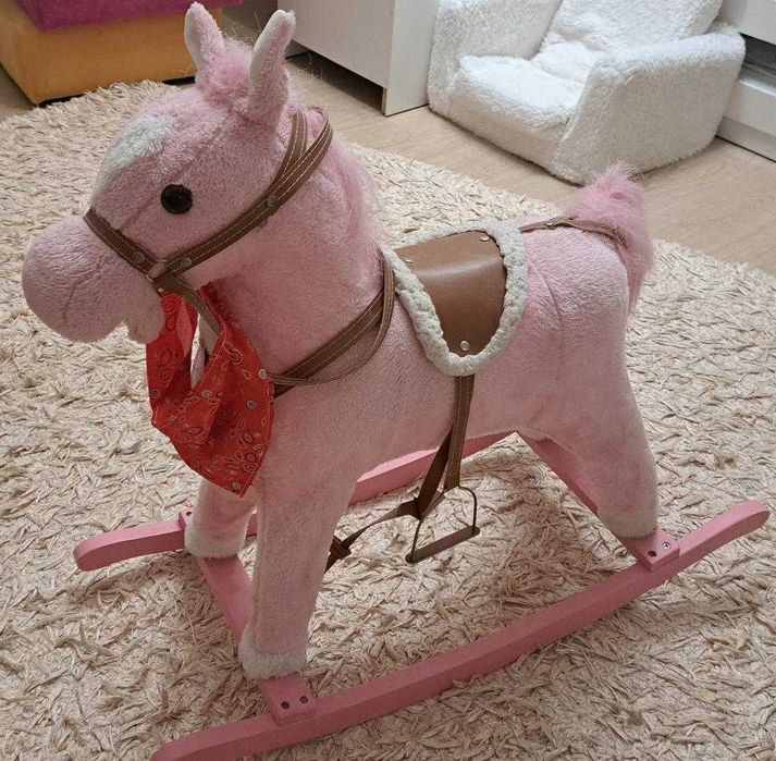 Calut balansoar, canta, misca gura, da din coada, cu lumini. Roz