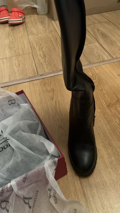 Зимние сапоги на каблуках