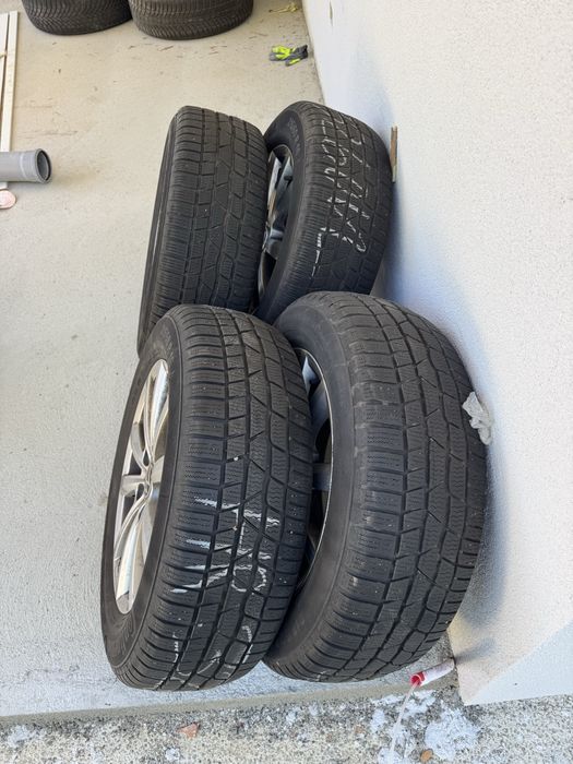 Anvelope de iarna  215 60 16,jante din aliaj originale VW Passat