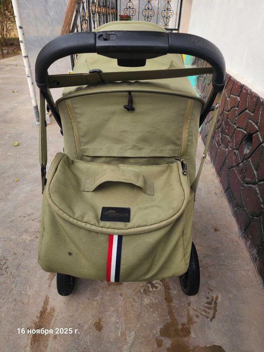 Teknum.  Детская прогулочная коляска.