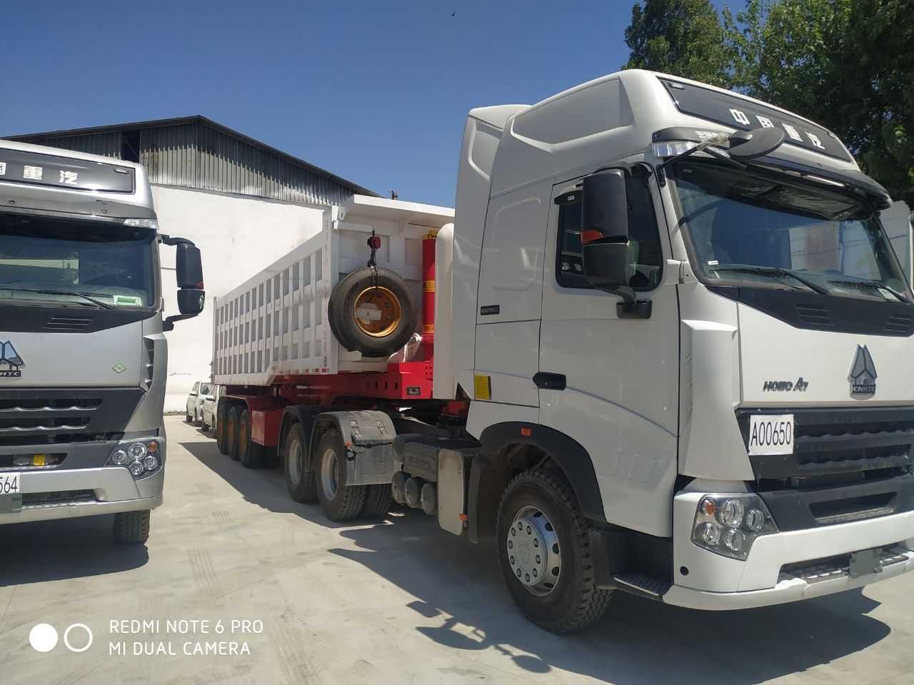 Газли тягач HOWO A+7 ва полуприцеп-самосвал – 60 тн.