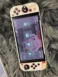 Vand Nintendo Switch Oled modat