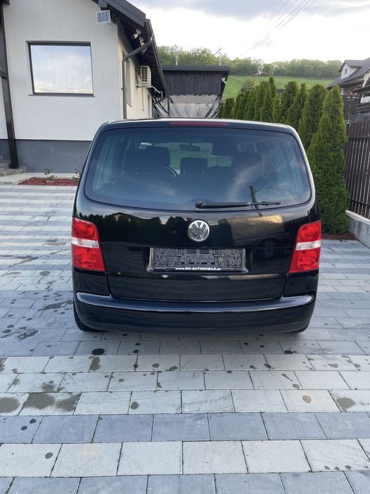 Volkswagen Touran 1,9 Diesel in 6 Trepte,Jante Aliaj,Geamuri Ionizate