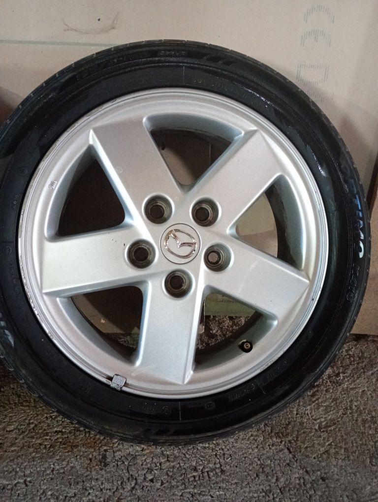MAZDA оригинални джанти със летни гуми 195/50/16 6 J ET50 цо 66