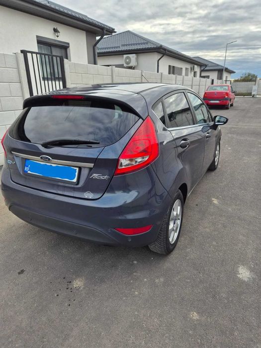 Ford Fiesta, 4 usi, 1,6l, 2011, 96 cp