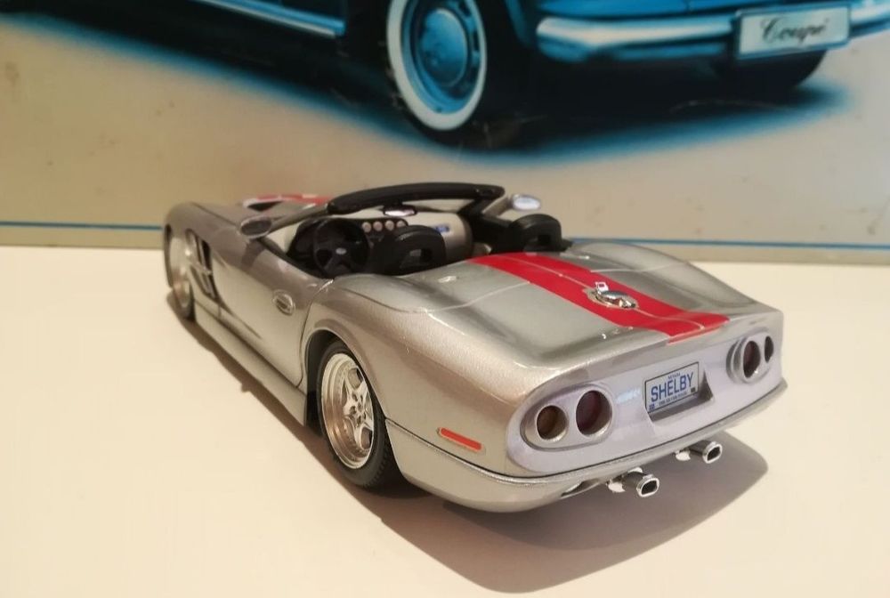 Shelby series1, anul1999 bburago 
Scara 1:18
Bburago

Pozele fac parte