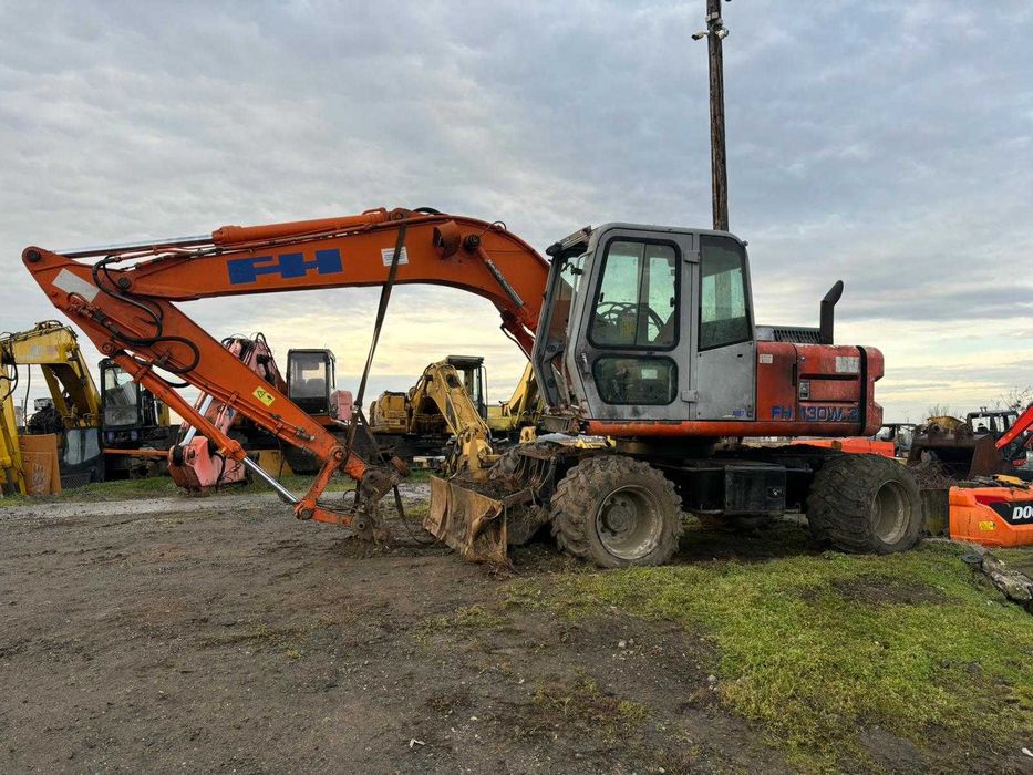 Dezmembrez excavator pe roti Fiat Hitachi FH 130W.3