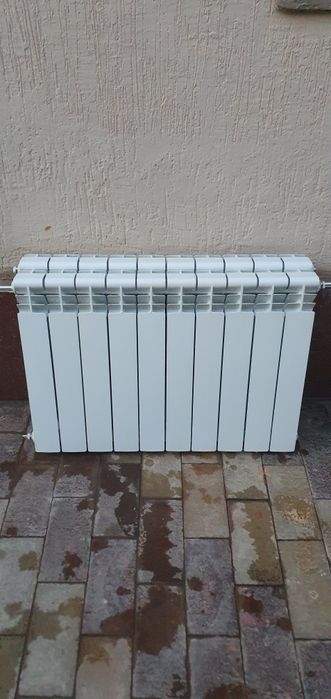 Янги, б/у биметал, алюмин ва панельный радиаторлар