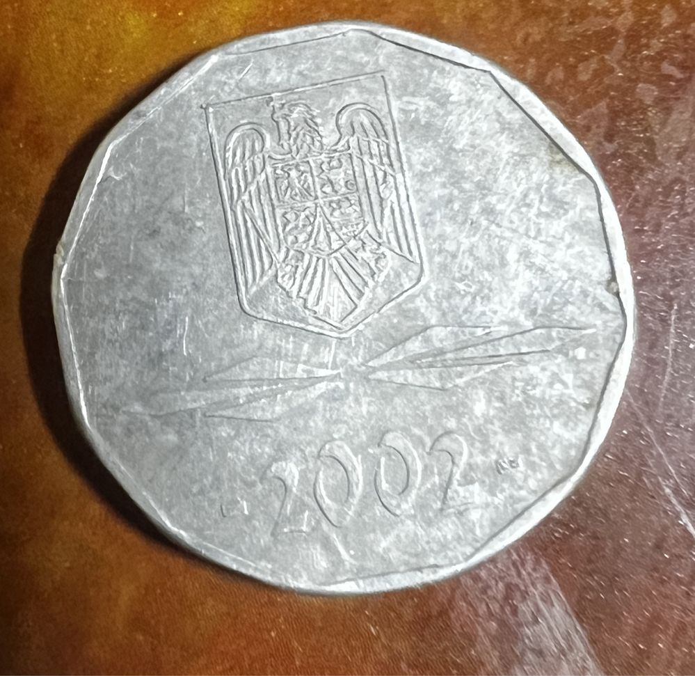 Vand moneda colectie 5000lei an 2002