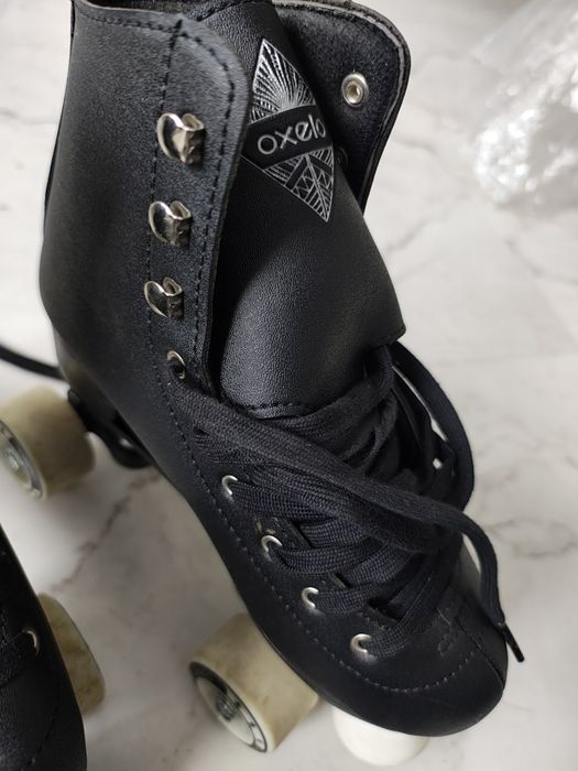 Vând role Oxello copii plus setul de protecție