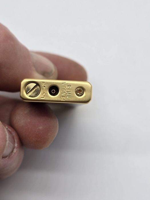 Bricheta veche Penguin mm 8