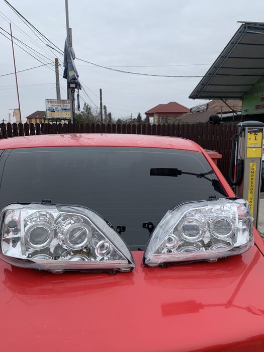 Vând faruri angel eyes logan