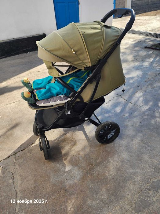 Teknum.  Детская прогулочная коляска.